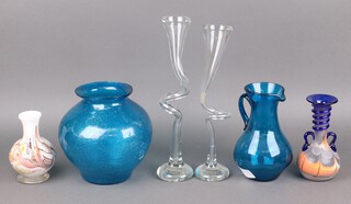 Two Stephen Copeland style clear glass vases/candlesticks 38cm, an Italian blue glass vase 21cm, blue glass jug and 2 vases 
