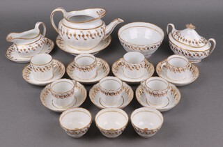 A 19th Century white and gilt decorated 22 piece tea service base marked 136, comprising circular plate (rings flat), teapot (lid a/f), sucrier and cover, cream jug and stand, slop bowl, 3 tea bowls and 3 saucers, 4 cups and 4 saucers (2 ring flat)