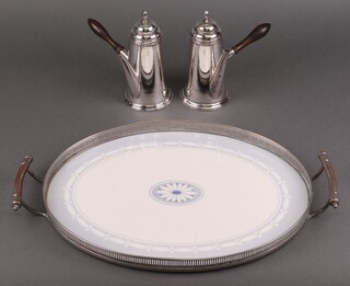 A silver plated cafe au lait set comprising milk and coffee pot (1 hinge a/f) and an oval galleried twin handled tray 