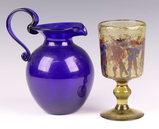 A Bristol Blue glass jug BR18707 15cm and a soda glass goblet decorated figures of musicians 