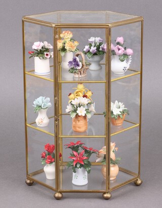 Franklyn Mint "Flowers of the Year" a collection of 13 contained in a gilt metal display cabinet complete with certificates 