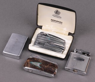 Three Ronson lighters (1 cased, 1 missing stopper to base) and a Zippo style petrol lighter 