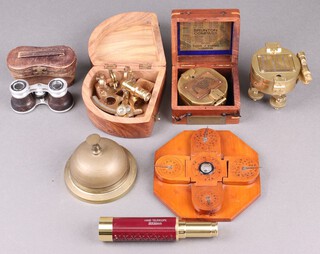 A reproduction brass sextant in a hardwood case, ditto compass, a Feng Shui compass etc 