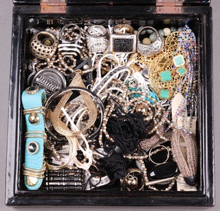 A collection of costume jewellery including rings, earrings, necklaces etc in a floral lacquered box 