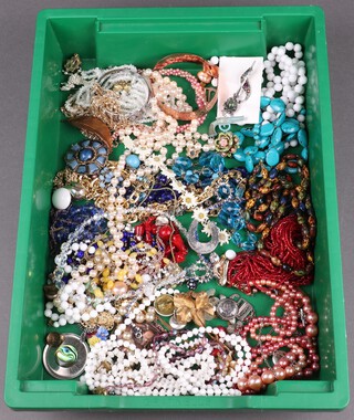 A quantity of costume jewellery including necklaces and brooches