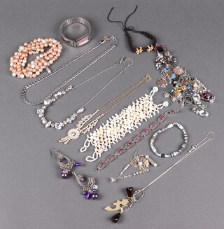 A collection of costume jewellery including beads, earrings, etc 