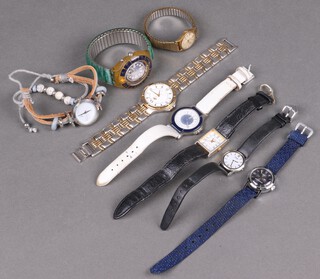A lady's Avia wristwatch contained in a gilt case, a lady's Timex wristwatch, a ladies Citizen wristwatch and 5 others