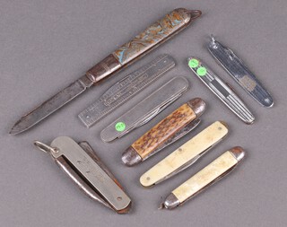 A Girl Guide folding pocket knife and 9 others