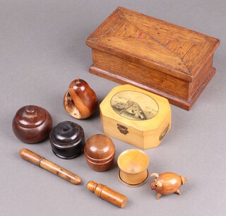 A Mauchline ware box decorated the harbour St Hellier Jersey, a carved yew pear and other items of treen etc 