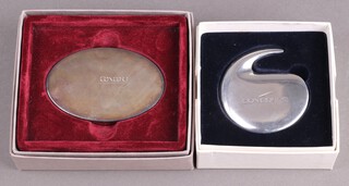 Two Concorde pewter paperweights 