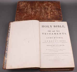 The Holy Bible containing The New and Old Testaments and The Apocrypha with annotations etc, composed by Ostervald in 2 folio calf bound volumes, London 1786 (boards and spine are detaching from book block, rubbing to binding, ex Libris Mr Francis Walker Staunton and Anne Carter Blandford  1798, 2 free end paper of 1 vol.)  
