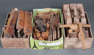 A large collection of wooden jack planes and moulding planes 