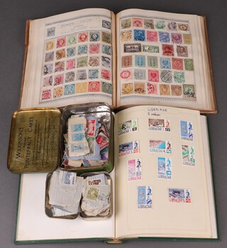 An album of Victoria and later GB stamps, an album of Empire stamps - India, Gibraltar and a small collection of loose stamps