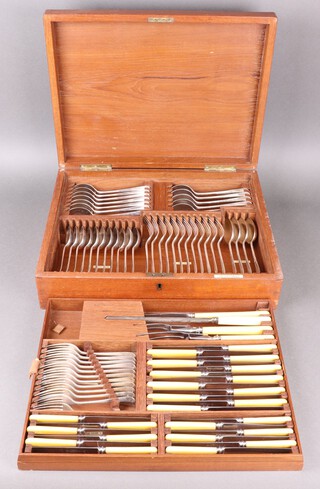 Thompson Ross & Sons, a 79 piece canteen of silver plated Old English and rat tail pattern cutlery comprising 12 soup spoons, 11 dessert spoons, 4 table spoons, 12 table forks, 12 dessert forks, 12 table knives, 12 cheese knives, carving knife, steel and 2 carving forks, all contained in a mahogany box 