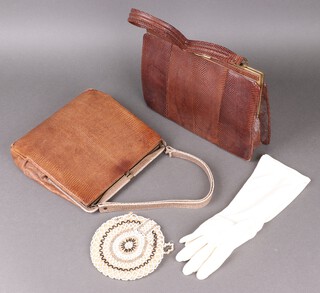 Two snakeskin handbags, a circular beadwork evening bag and a pair of evening gloves 