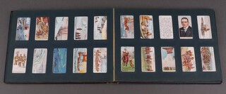 An album of Players and other cigarette cards