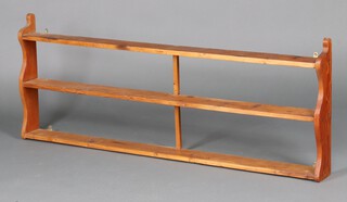 A pine 3 tier wall shelf 55cm h x 147cm w x 12cm d 
