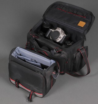 A collection of SLR cameras to include a Pentax Programme A, Pentax P30, Canon EOS300 and 2 soft Pentax carry cases and a collection of lenses  