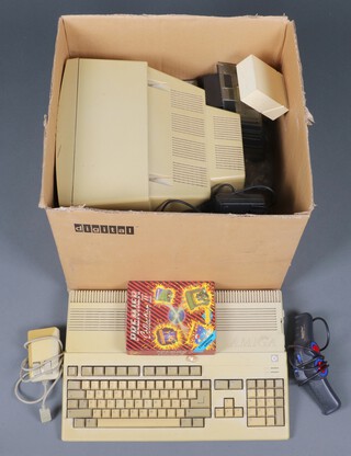 A Commodore Amiga personal computer (not guaranteed to be working) together with a monitor, power supply and accessories 
