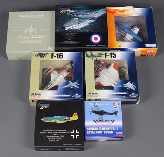 A collection of various boxed model planes by Sky Guardians and others to include F-16, F-15, F104 Star Fighter, a Fairey Gannet, a Gemini Aces P-51B Mustang, a Hawker Sea Fury and a Gemini Aces McDonnell Douglas Phantom FG.1 