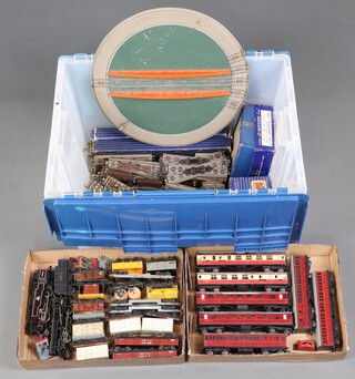 A quantity of Hornby Dublo track, rolling stock, locomotives and power supplies 
