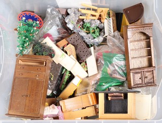 A large collection of dolls house furniture 