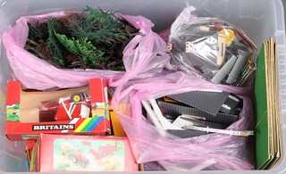 A large quantity of plastic Britains accessories including farming machinery, scenery and buildings 
