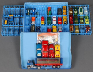 A collection of Corgi and Matchbox together with a Matchbox carry case 