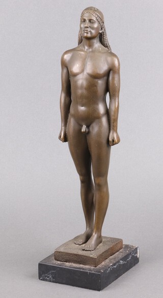 After the antique, a figure of a Greek Kouros, on a marble base 41cm high 