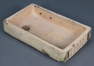A rectangular shallow sink 15h x 76w x 45d 