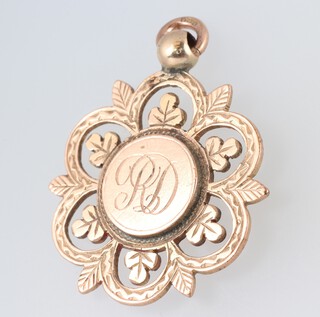 A 9ct gold engraved and monogrammed RD floral shaped pendant, 3.5cm, 7.6g