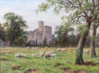 Joseph Dixon Clark (British, 1849-1944), Landscape with Sheep Grazing and Castle beyond, possibly Alnwick, oil on canvas, 27cm x 36cm, within a painted and gilt composition frame.
