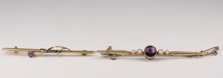A gold marked 15ct bar brooch set amethyst and pearls 3.5g, together with a gold marked 9ct bar brooch set an amethyst with gilt metal pin 1.2g