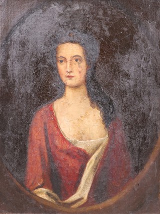 Follower of Godfrey Kneller,? Portrait of a Lady wearing a Red Dress within a feigned oval, oil on canvas, 28cm x 21cm, within a gilt composition frame.	