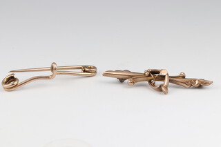 A 9ct gold bar brooch and a gold testing as 9ct bar brooch, 4.1g gross