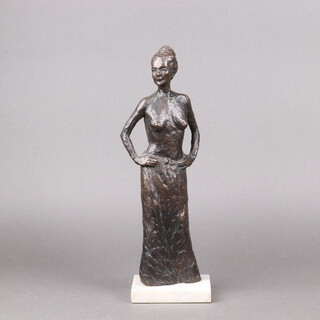 Nancy Banks, a bronze figure of a standing lady with hands on hips, on a white marble base labelled Nancy Banks, B1 Marine Gate, Marine Drive, Brighton 36cm h 
