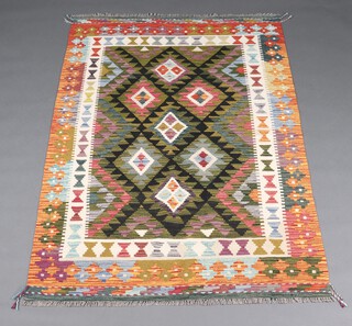 A white, orange, green and black ground Maimana Kilim with overall geometric designs 187cm x 122cm 