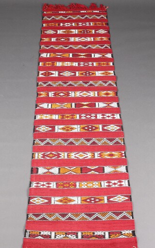 A red and white ground Moroccan Berber Zemmour Kilim runner 268cm x 67cm