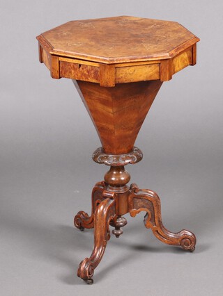 A Victorian inlaid figured walnut octagonal work box of conical form, raised on a tripod base with brass casters 69cm h x 43m w x 44cm d