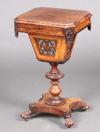 A William IV octagonal tapered rosewood work table with hinged lid and fitted interior, the base with pierced panels, raised on a turned column and triform base with paw feet 70cm h x 44cm w x 36cm d 
