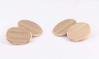 A pair of 9ct gold oval cufflinks 7.8g
