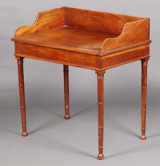 A Victorian bleached mahogany rectangular wash stand with 3/4 gallery, raised on turned supports 84cm h x 79cm w x 52cm d 