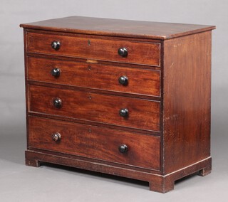A 19th Century mahogany chest of 4 drawers with ebonised turned handles, raised on a platform base 88cm h x 105cm w x 54cm d 