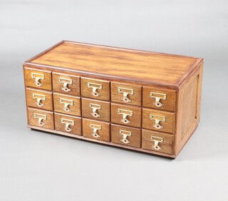 A 1930's oak table top index card chest, fitted 15 drawers 40cm h x 84cm w x 42cm d 