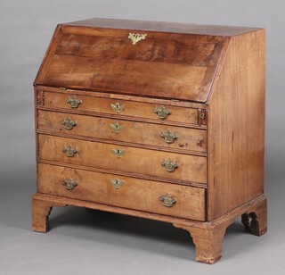 A Georgian yew and mahogany bureau with fall front revealing a well fitted interior with drawers and pigeon holes, above 3 drawers with replacement brass swan neck drop handles, raised on bracket feet 100cm h x 99cm w x 52cm d 