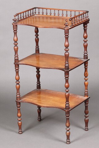 A Victorian rectangular bleached mahogany 3 tier what-not of serpentine outline and  with bobbin turned 3/4 gallery 94cm h x 47cm w x 34cm d 