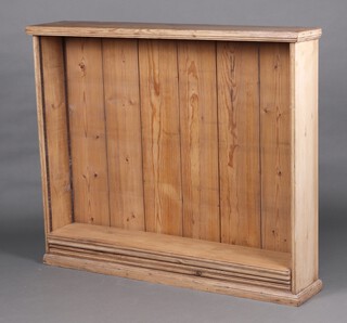 A 19th Century pine bookcase fitted adjustable shelves 119cm h x 146cm w x 28cm d 