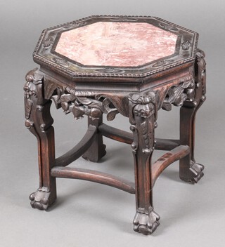 A Chinese octagonal carved and pierced hardwood jardiniere stand with pink veined marble top 46cm h x 43cm w x 43cm 