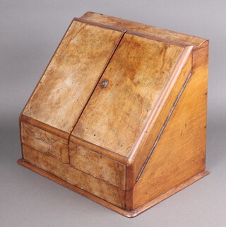A Victorian bleached walnut wedge shaped stationery box, (the calendar and the interior are missing) 35cm h x 41cm w x 28cm d 