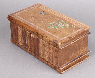 An inlaid walnut puzzle box in the form of a book, the lid marked Rio De Janeiro 10cm h x 23cm w x 13cm d 